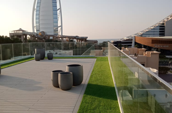 Artificial grass on terrace building